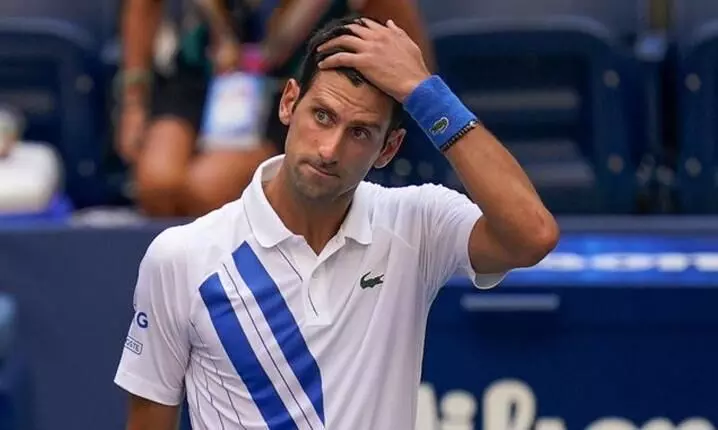 US Open: Djokovic disqualified after hitting line official with ball