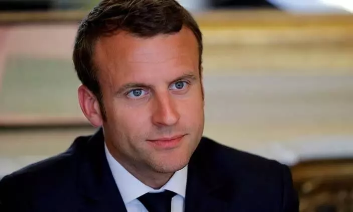 French President Macron slapped in open; two arrested