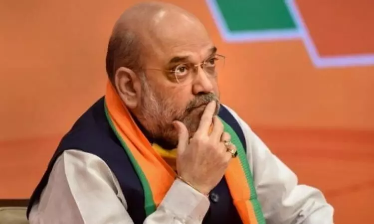 Hoardings belittling Tagore with giant pictures of Amit Shah spark controversy