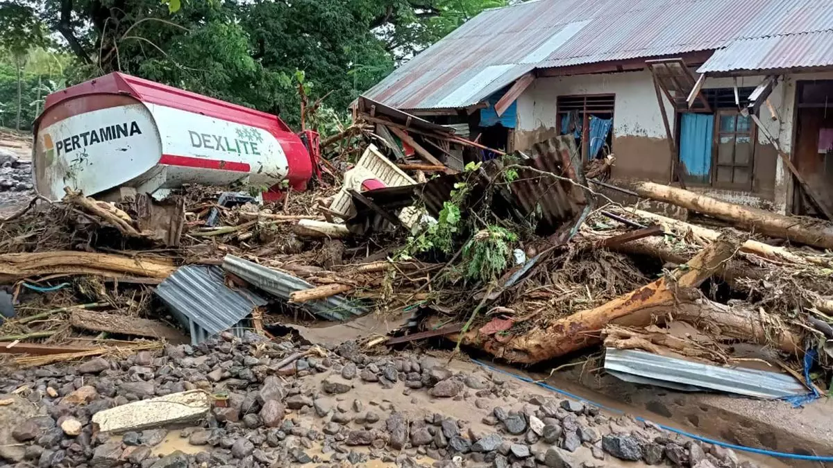 Over 100 dead in Indonesia landslides, floods