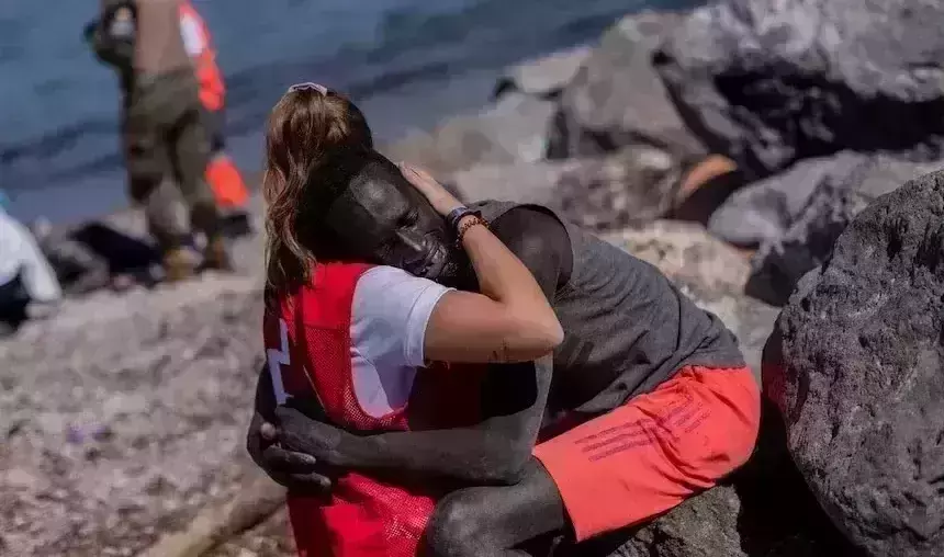 Spanish Red Cross worker faces racist backlash for hugging African migrant
