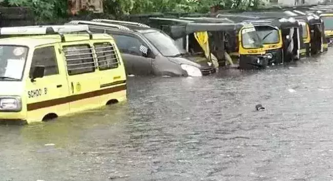 Heavy rain causes waterlogging in Mumbai: Trains, buses restricted