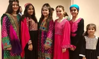Afghan women protest Talibans hijab mandate by posting photos in colourful outfits