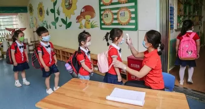 Chinas Covid resurgence spreading to schools, kindergarten