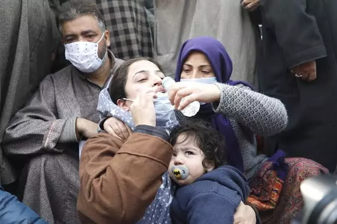 Families of Kashmiri men killed in raid removed from protest site
