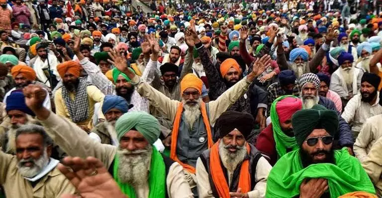 Farmers to hold victory march today after year-long protest comes to end