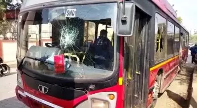 Angered at 50% capacity limit, people block road, vandalise bus in Delhi