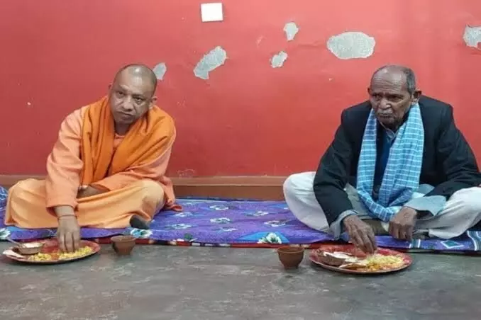 Samajwadi party of social exploitation says Yogi Adityanath on visit to Dalit household