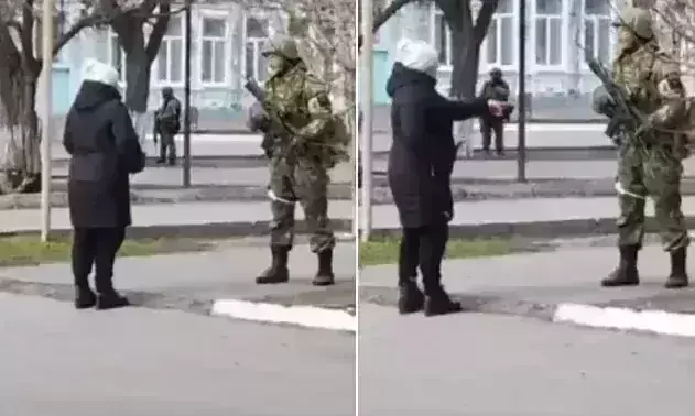  Fearless Ukrainian woman confronts Russian soldiers