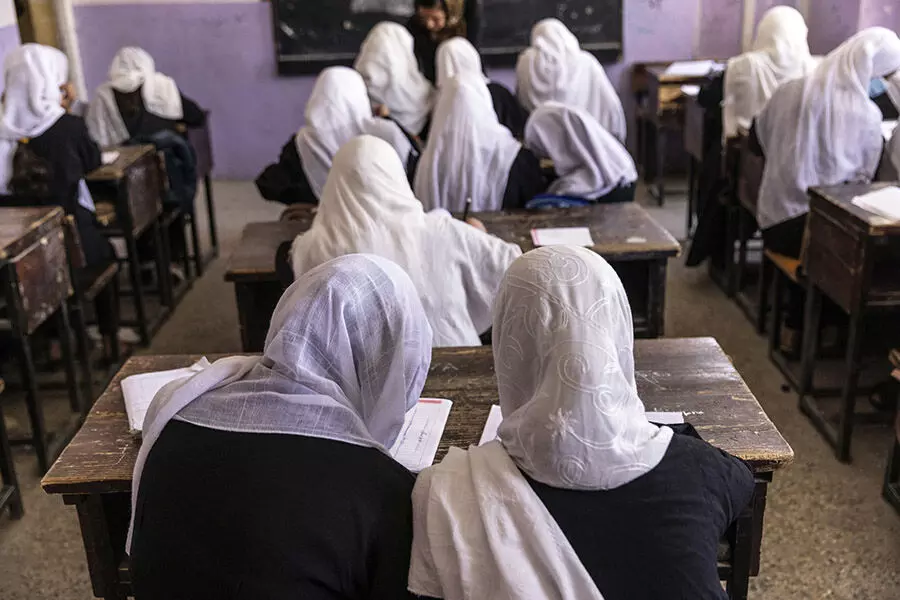 Afghan girls appear in schools again after 9 months under Taliban