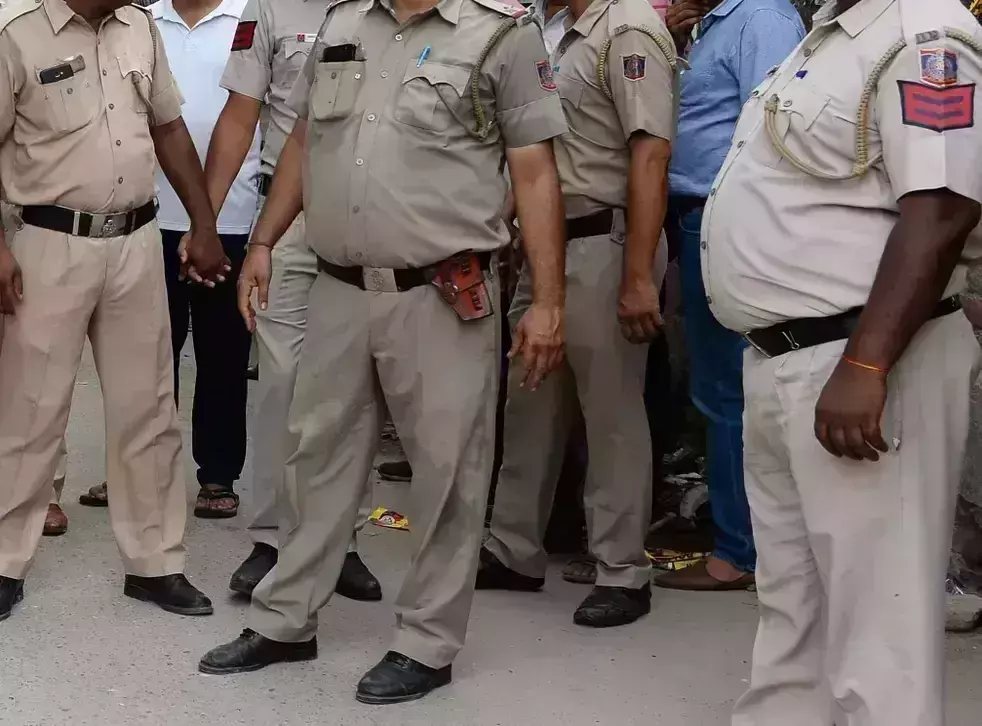 UP Man chases cops at Gorakhnath temple with sickle