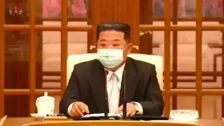 Amid covid surge, Kim Jong-un wears mask 1st time