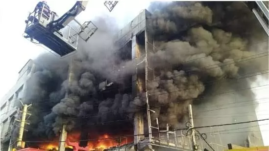 Death toll rises to 27 in massive fire near Delhis Mundka metro station, many injured
