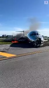 Dominican aircraft with flames on tail crash lands on US airport