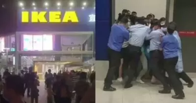 Health guards force to lock customers inside Chinese Ikea store