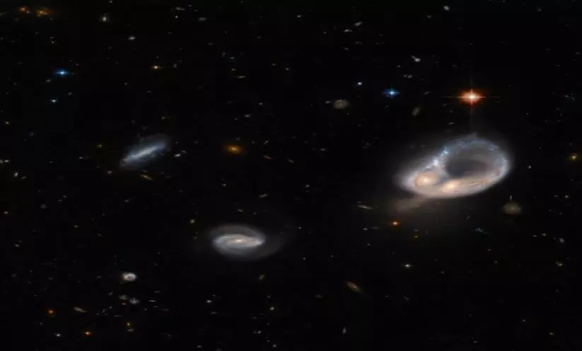 When galaxies collide; Hubble captures spectacular phenomenon in ancient universe