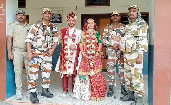 Gujarat polls: couple cast vote in wedding attire, photos go viral