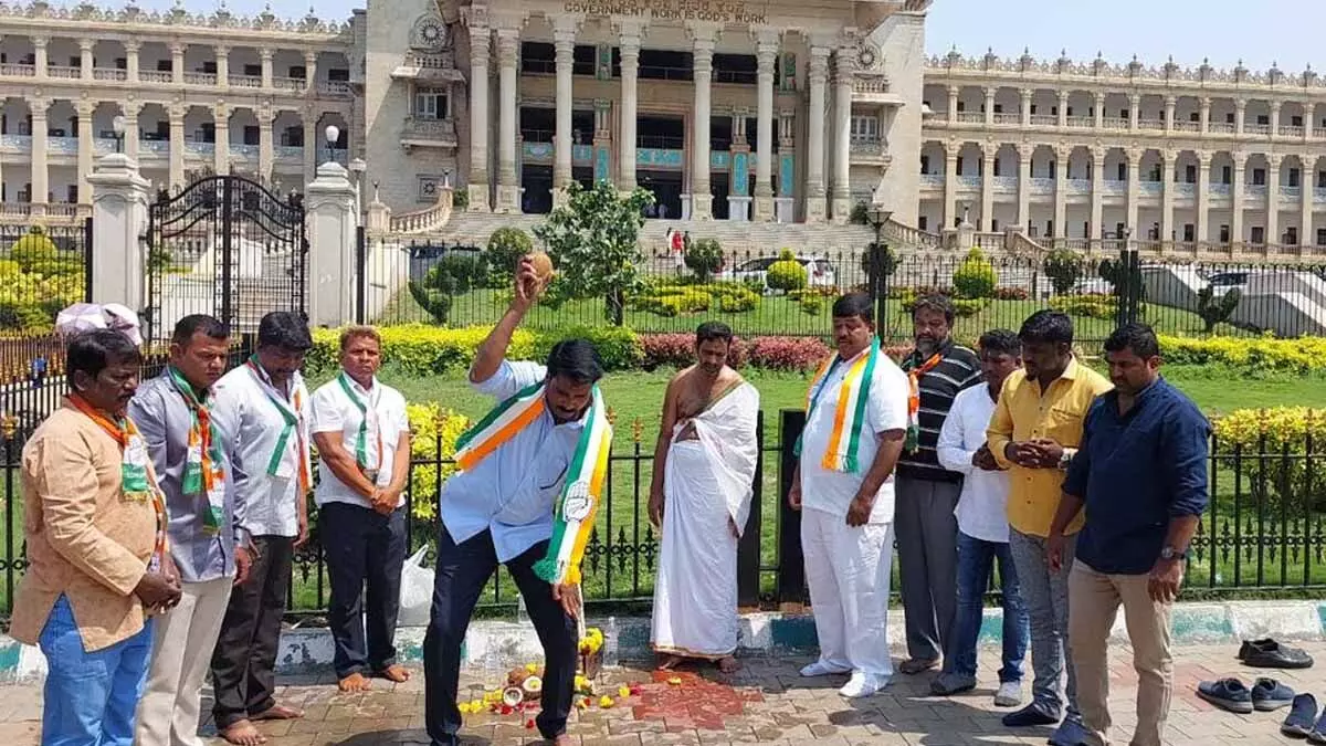 Congress workers purify Ktaka Vidhana Soudha with cow urine as corrupt BJP rule ends