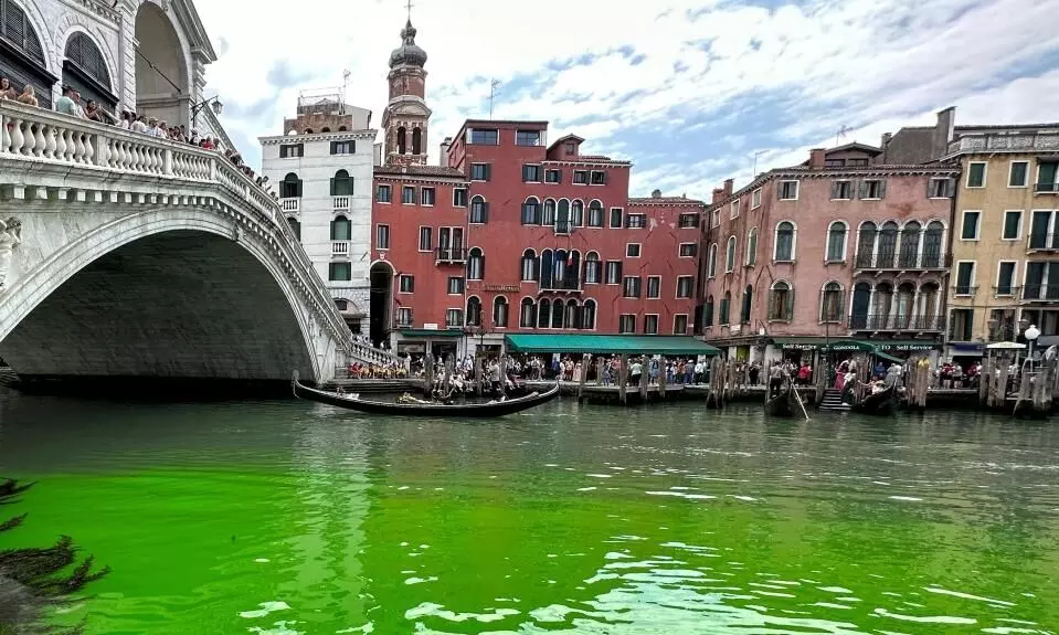 Venice canal water turns fluorescent green, probe launched
