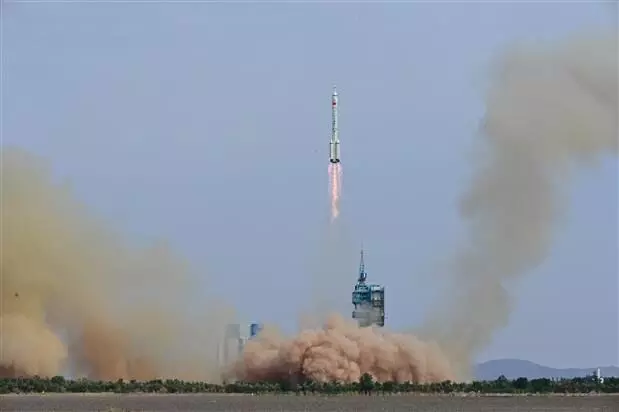 New manned spacecraft launched by China with first civilian on board