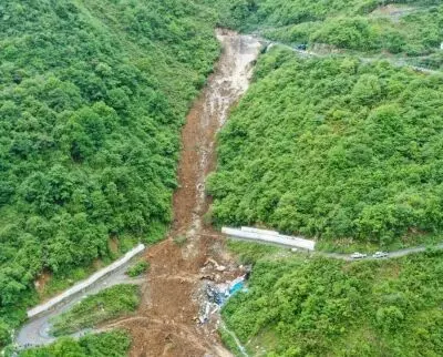 China mountain collapse toll estimated at 19, five missing