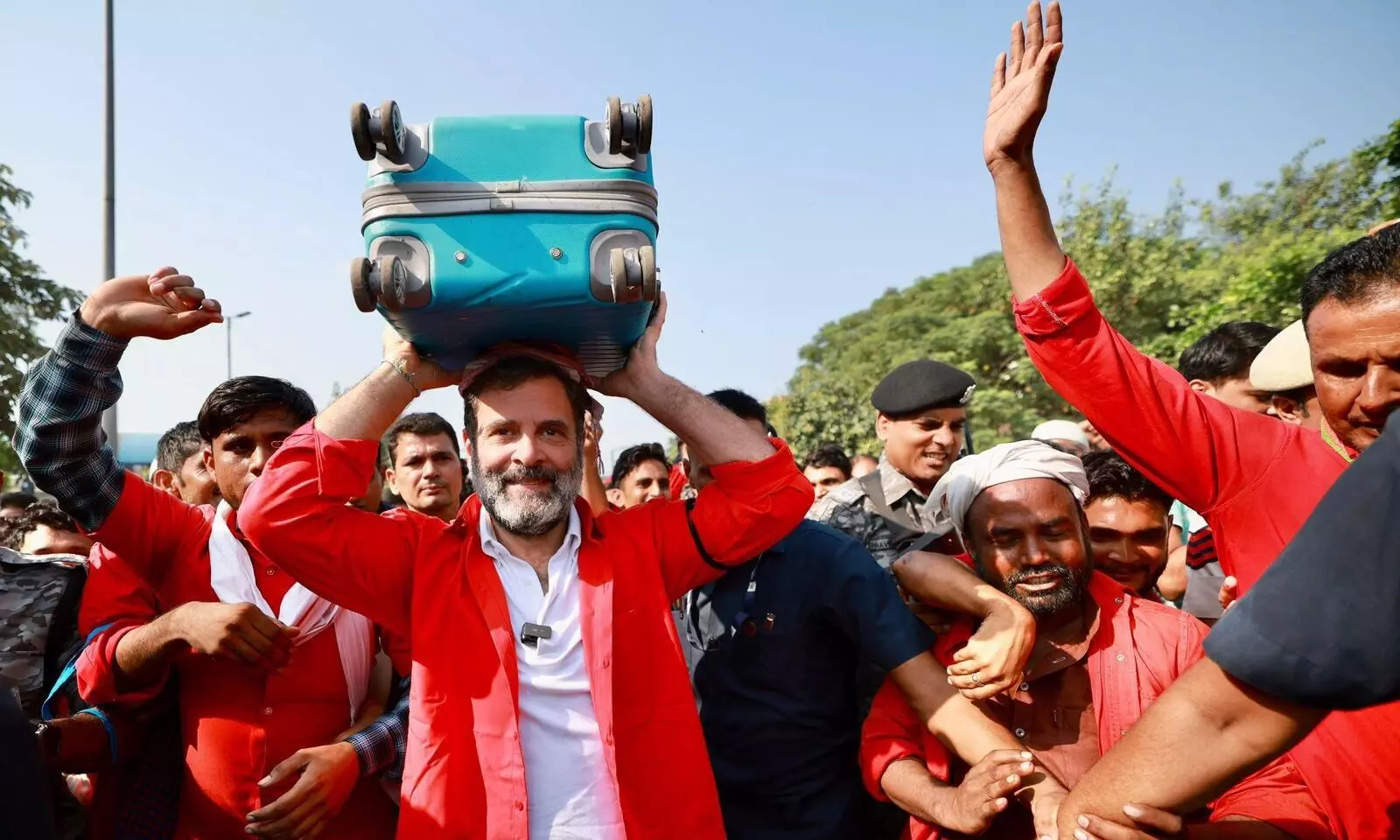 Rahul Gandhi lifts spirits and luggage while donning coolie shirt with railway porters