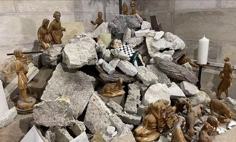 Palestine church uses debris as Xmas tree to protest Israeli attack