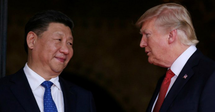 After lavish welcome in China, Trump holds talks with Xi over North Korea, trade